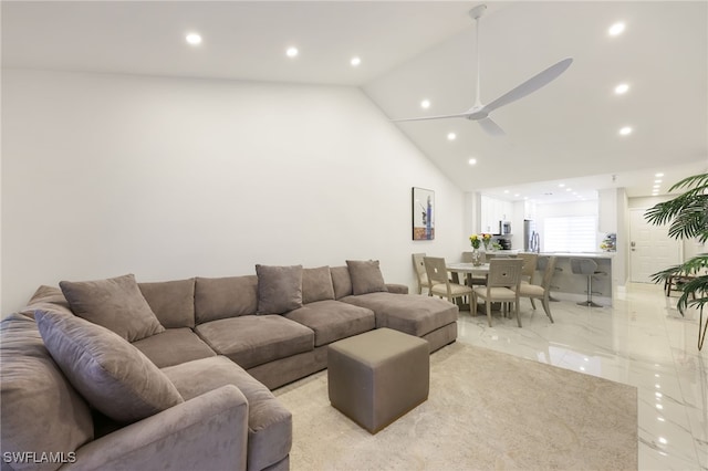 living room featuring high vaulted ceiling and ceiling fan