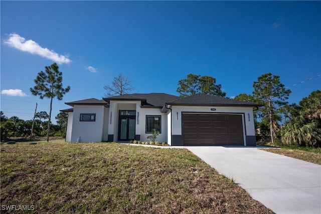 1254 Ellipse St E, Lehigh Acres, FL 33974 - prairie-style home featuring stucco siding, an attached garage, driveway, and a front yard