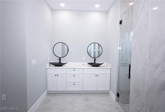 1254 Ellipse St E, Lehigh Acres, FL 33974 - full bath featuring a sink, double vanity, a marble finish shower, marble finish floor, and baseboards