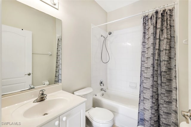 full bathroom featuring shower / tub combo, vanity, and toilet