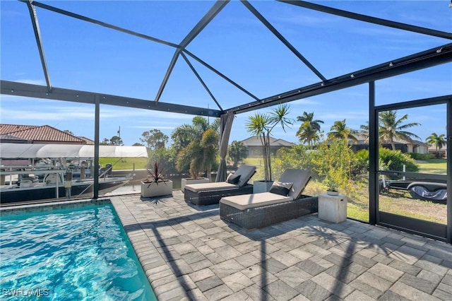 exterior space with a lanai and a patio area