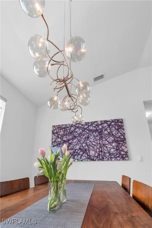 dining area featuring a chandelier