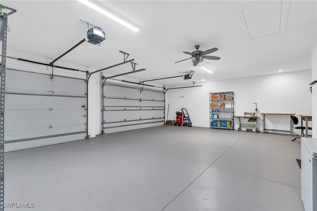 garage featuring a garage door opener and ceiling fan