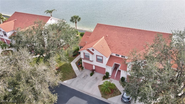 bird's eye view with a water view