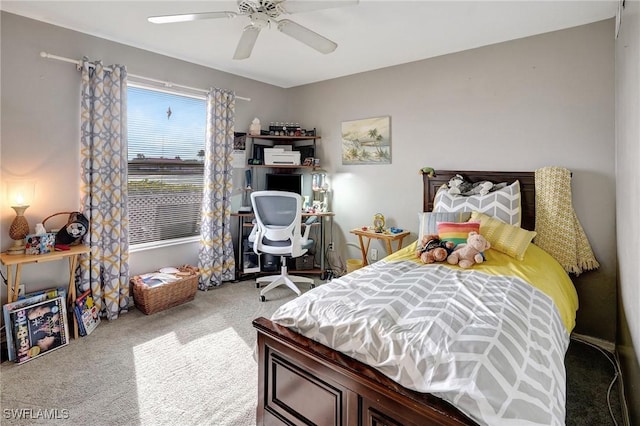 bedroom with ceiling fan and carpet flooring