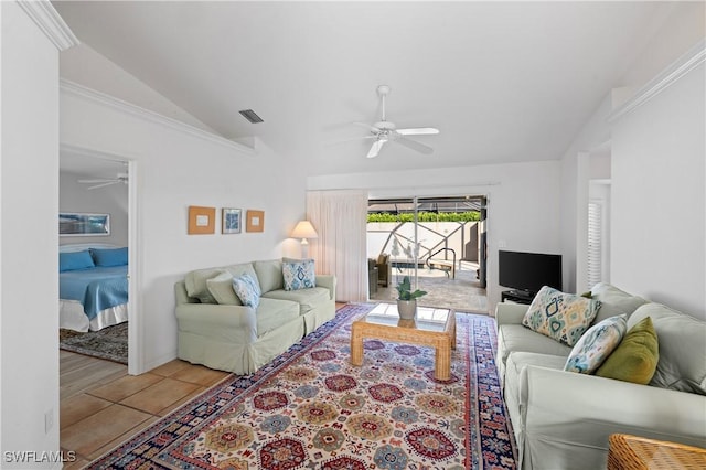 living room featuring lofted ceiling, light tile patterned floors, and crown molding