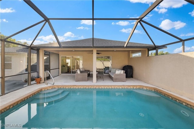 view of pool with an outdoor hangout area, a lanai, a patio, and ceiling fan