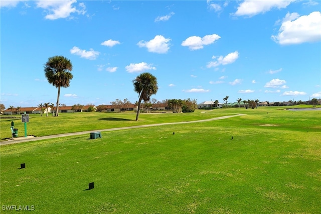 view of home's community featuring a lawn