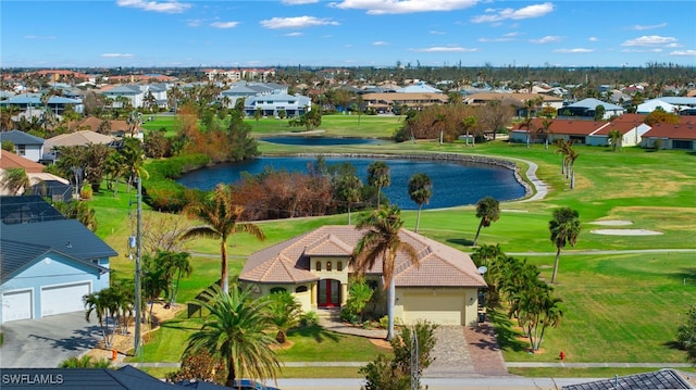 bird's eye view with a water view