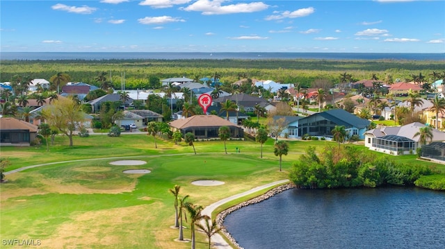 birds eye view of property with a water view