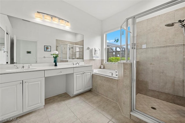 bathroom featuring plus walk in shower, tile patterned flooring, and vanity