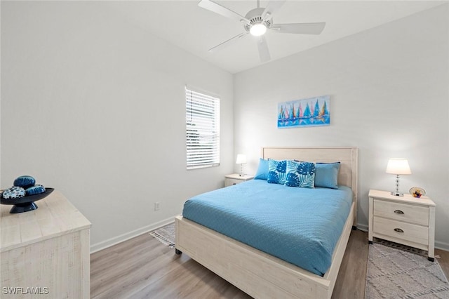 bedroom featuring ceiling fan and light wood-type flooring