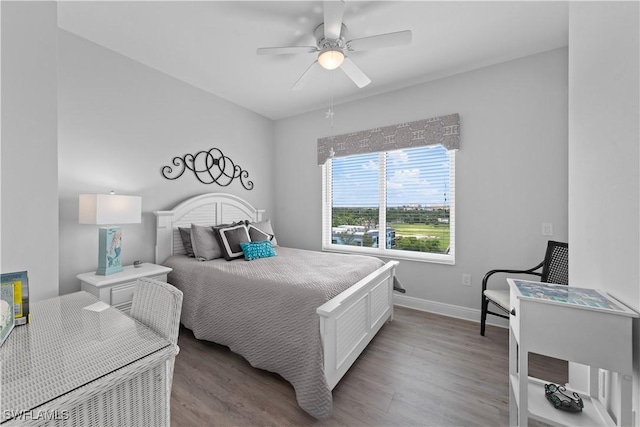 bedroom featuring ceiling fan and light hardwood / wood-style floors