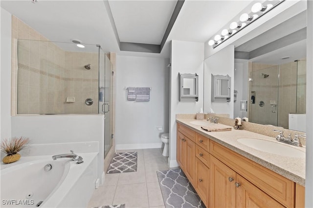 full bathroom featuring separate shower and tub, tile patterned flooring, vanity, and toilet