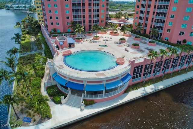 exterior space with a patio area and a water view