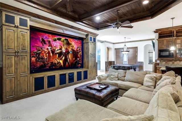 home theater featuring wooden ceiling, beamed ceiling, pool table, ornamental molding, and ceiling fan