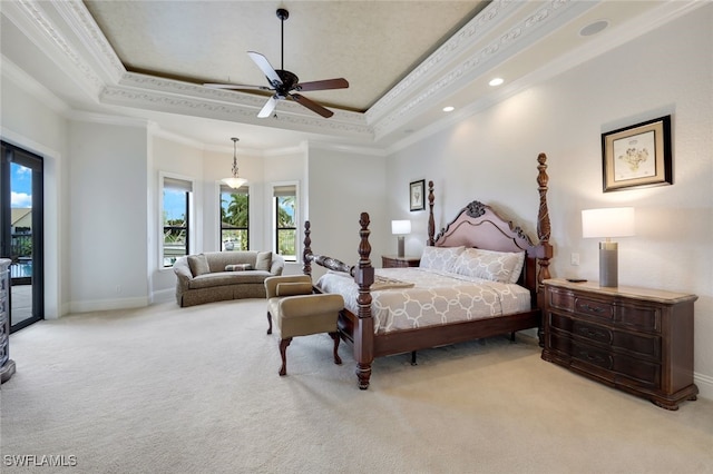 bedroom featuring a raised ceiling, light colored carpet, crown molding, ceiling fan, and access to exterior