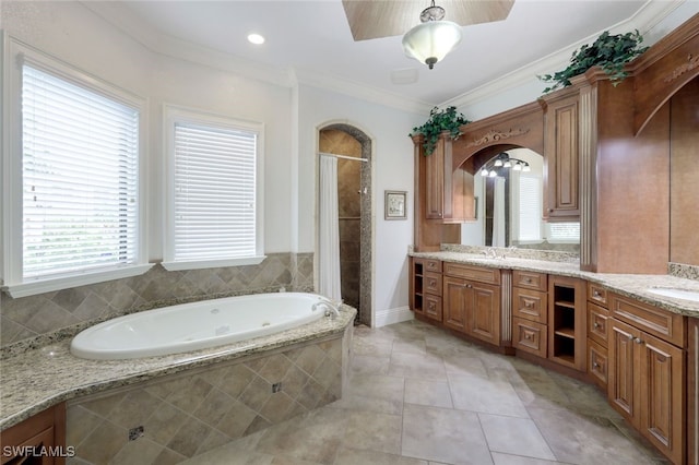 bathroom with shower with separate bathtub, vanity, tile patterned floors, and ornamental molding