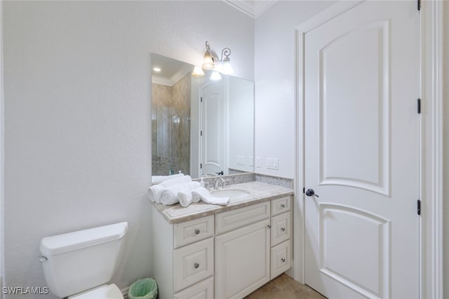 bathroom with toilet, an enclosed shower, ornamental molding, and vanity