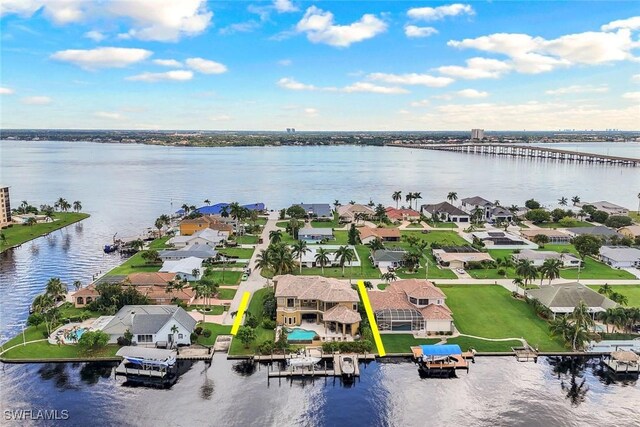 bird's eye view with a water view