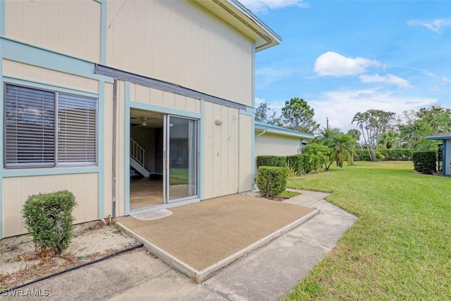 exterior space featuring a yard and a patio