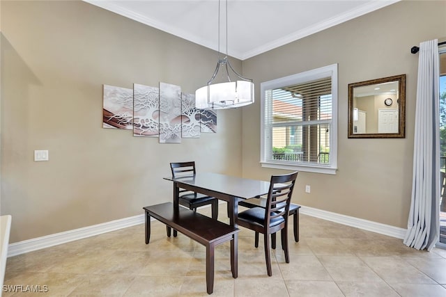 dining space with light tile patterned flooring, crown molding, and a chandelier