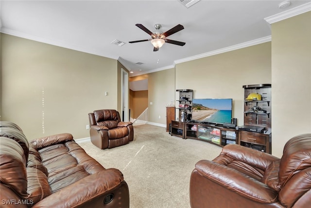 carpeted living room featuring ceiling fan and crown molding