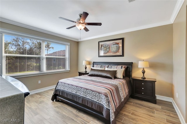 bedroom with ceiling fan, light hardwood / wood-style floors, and crown molding