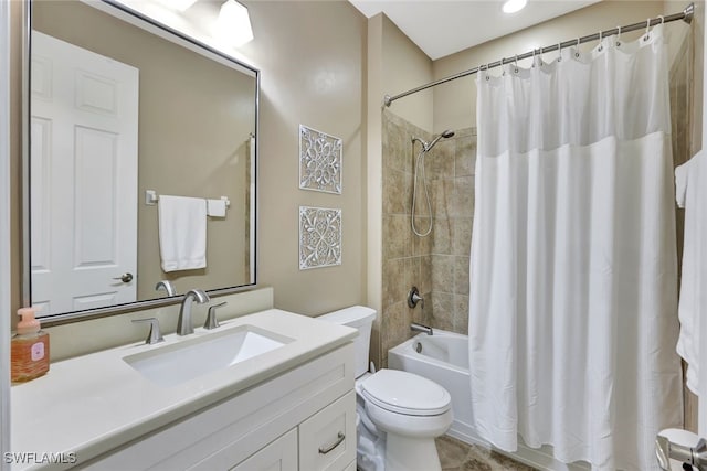 full bathroom with toilet, vanity, and shower / bath combination with curtain