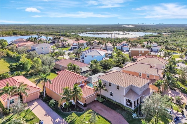 drone / aerial view with a water view