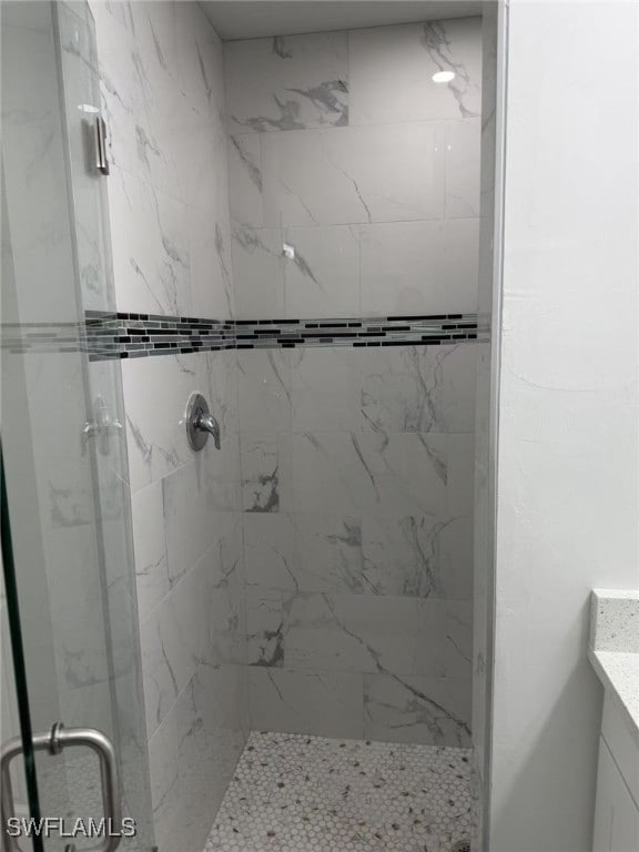 3708 15th St SW, Lehigh Acres, FL 33976 - bathroom featuring a stall shower