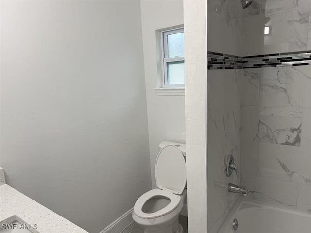 3708 15th St SW, Lehigh Acres, FL 33976 - full bath with toilet, shower / bath combination, and baseboards