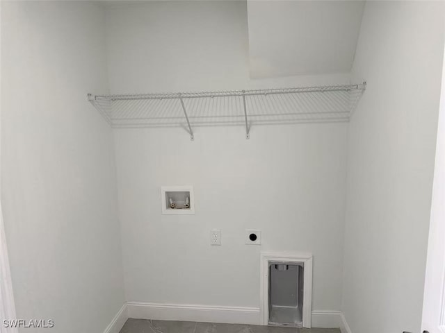3708 15th St SW, Lehigh Acres, FL 33976 - laundry room featuring electric dryer hookup, hookup for a washing machine, and baseboards