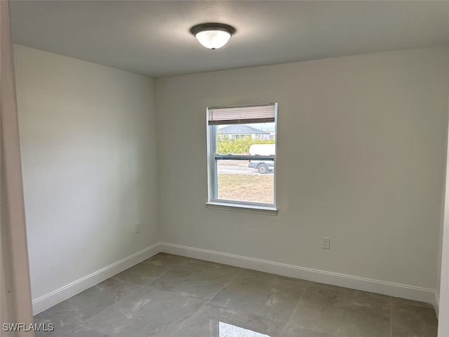 3708 15th St SW, Lehigh Acres, FL 33976 - spare room featuring baseboards