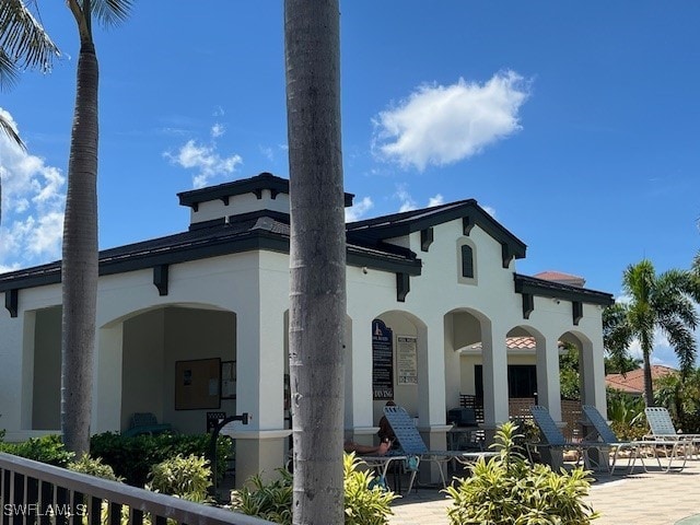 back of property with a patio area