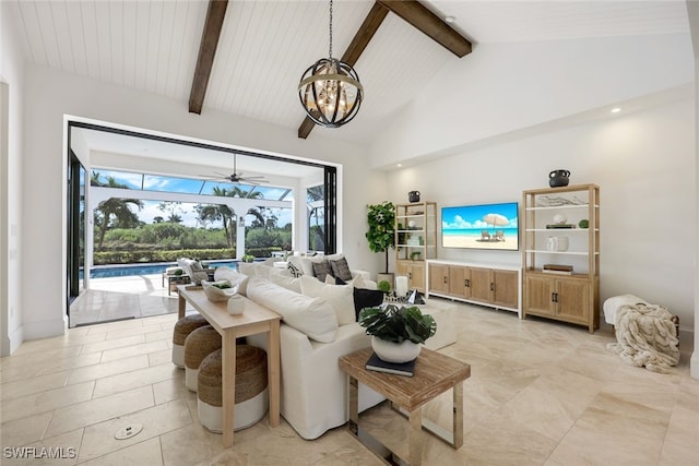 living room with high vaulted ceiling, beam ceiling, and an inviting chandelier