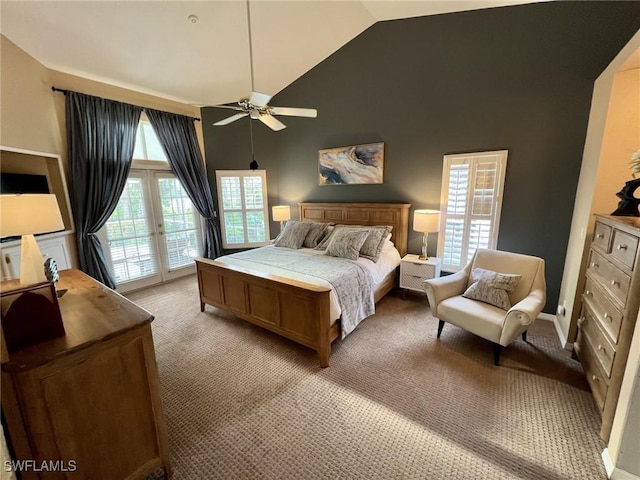 carpeted bedroom with ceiling fan, access to exterior, and high vaulted ceiling