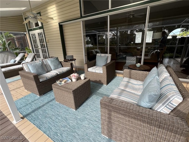 view of patio featuring an outdoor hangout area, french doors, and ceiling fan