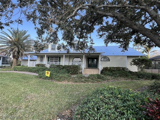 view of front of property with a front lawn and covered porch