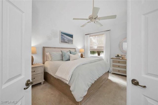 carpeted bedroom with ceiling fan