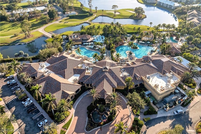 bird's eye view with a water view