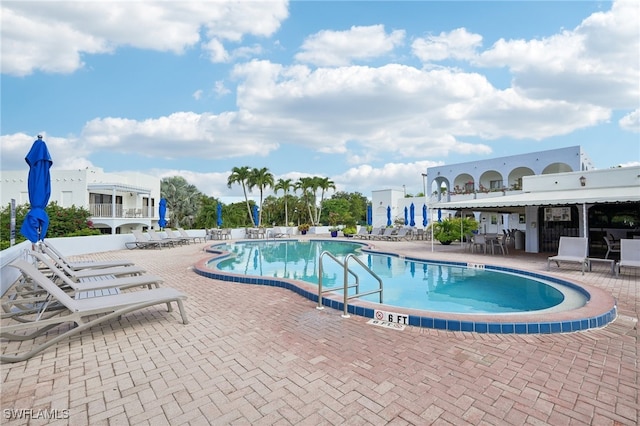 view of pool with a patio