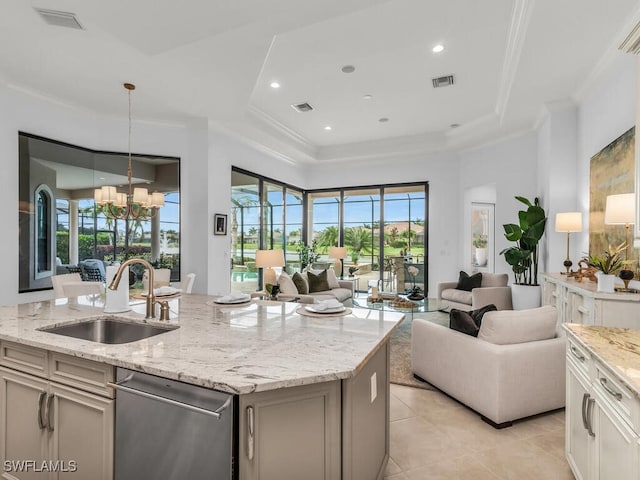 6564 Costa Cir, Naples, FL 34113 - kitchen with a sink, open floor plan, stainless steel dishwasher, ornamental molding, and light stone countertops