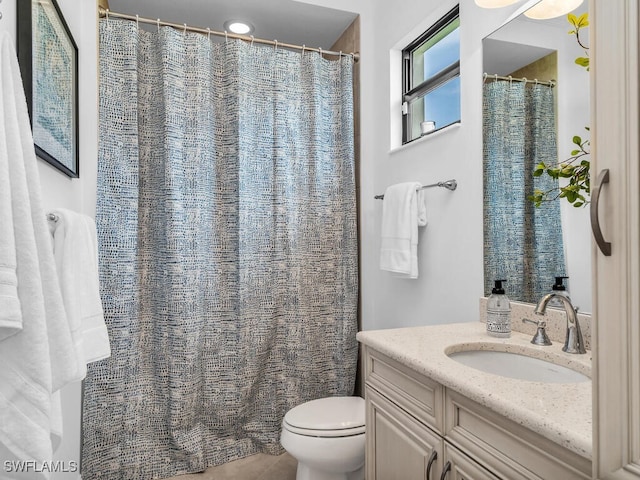 6564 Costa Cir, Naples, FL 34113 - full bath featuring vanity, toilet, and curtained shower