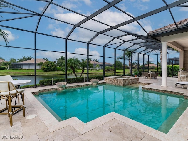 6564 Costa Cir, Naples, FL 34113 - view of swimming pool with a patio area, a pool with connected hot tub, glass enclosure, and a water view