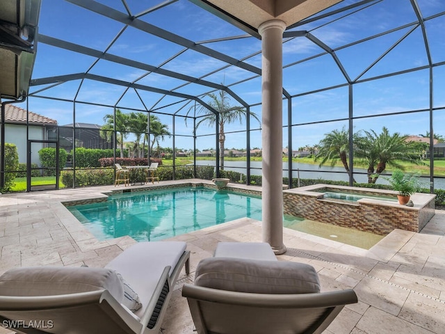 6564 Costa Cir, Naples, FL 34113 - swimming pool featuring an in-ground hot tub, a water view, a patio, and a lanai