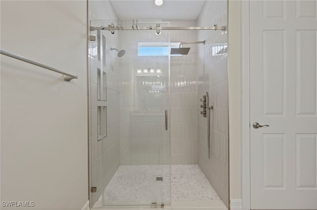 bathroom with an enclosed shower