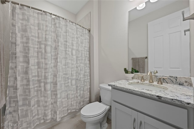 full bathroom featuring vanity, toilet, tile patterned flooring, and shower / bath combo