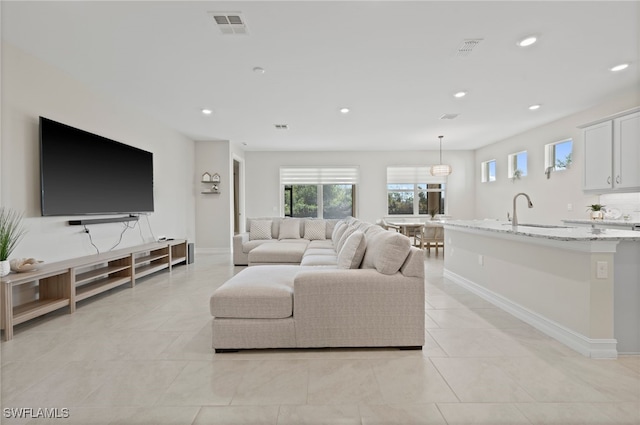 tiled living room with sink