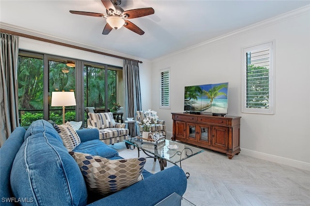 living room with ornamental molding, light parquet flooring, and ceiling fan